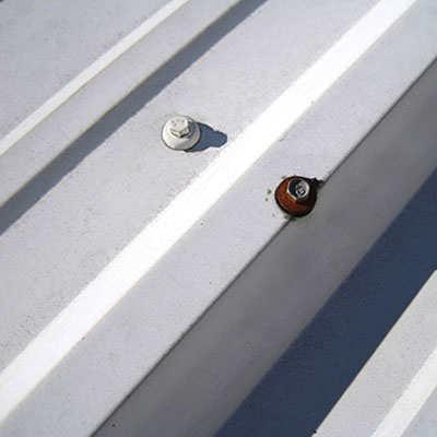 Fastener Fatigue: Why Screws Fail Years Before the Roof Does