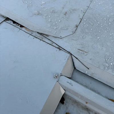 Roof sheet deformation increasing future leak risk