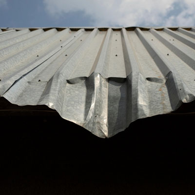 Roof dent impact on drainage and sheet profile