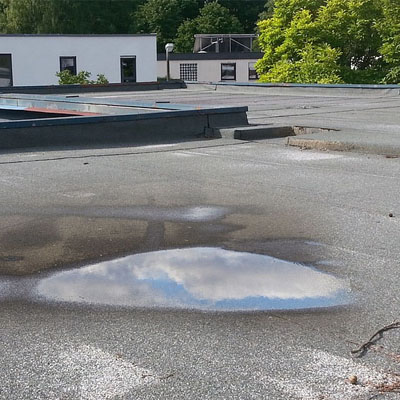 Water Can Pool On A Poorly Pitched Roof