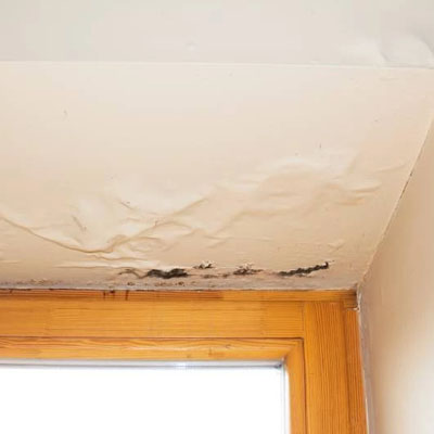 Why Roof Valley Defects Can Lead to Persistent Leaks - Leaking visible on ceiling