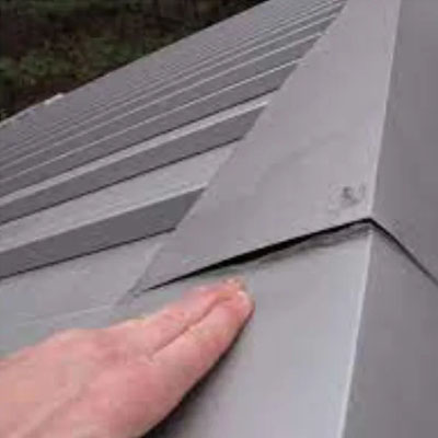 Common Metal Roof Ridge Capping Problems That Lead to Leaks - Defective Ridge Capping
