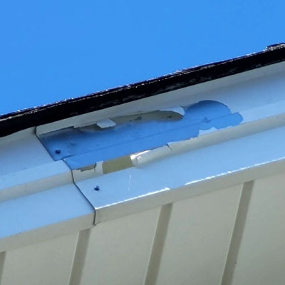 How Fascia Problems Can Point to Larger Roof Drainage Issues - Peeling Paint