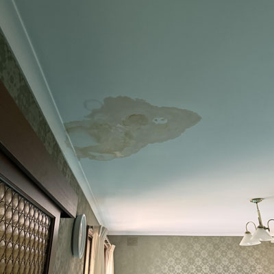 7 Signs You Need a Roof Inspection - Ceiling stain from moisture