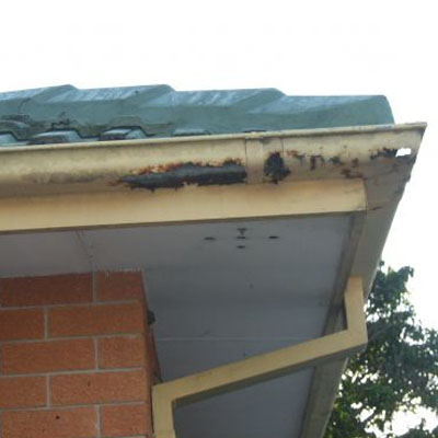 Roof Inspections Before Buying a Property on the Gold Coast - Corroded roof guttering