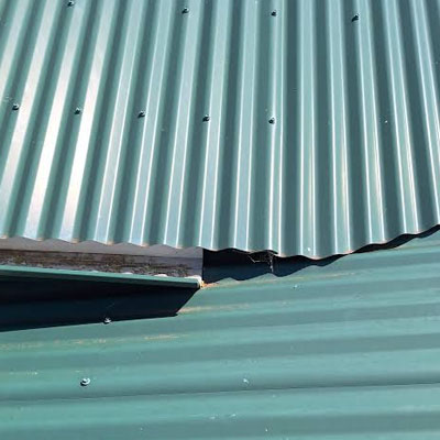 Should You Get a Roof Inspection Before New Build Handover - Metal roof defects on new build