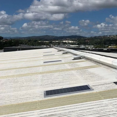 Why Does the Roof Only Make Noise When It’s Windy - Commercial roof with solar and vents